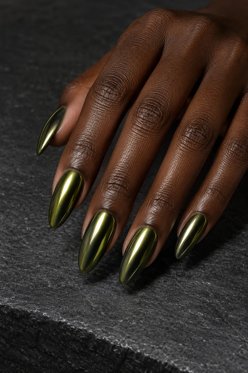 Reflective olive green chrome nails with metallic highlights