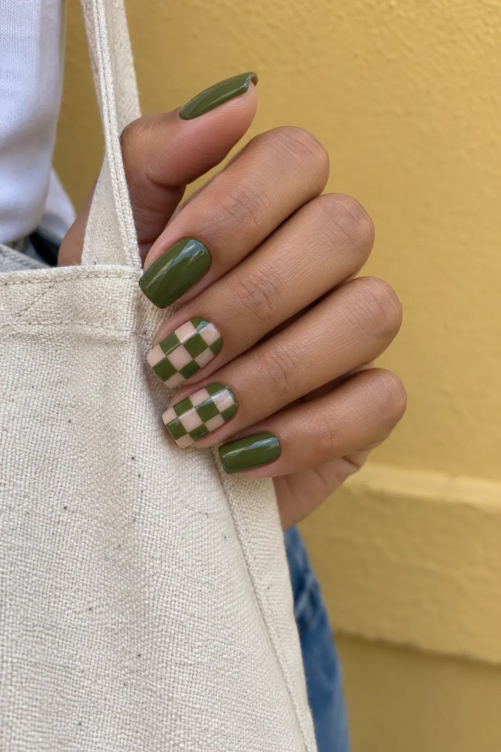 Olive green and sheer nude checkerboard nail art